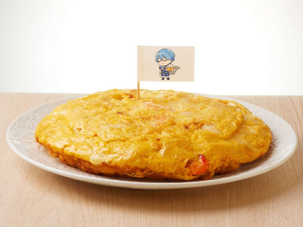 Omelette con una banderilla con la ilustración del personaje Himmel